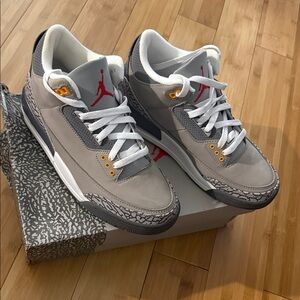Jordan Gray and White Sneakers with Red Accents